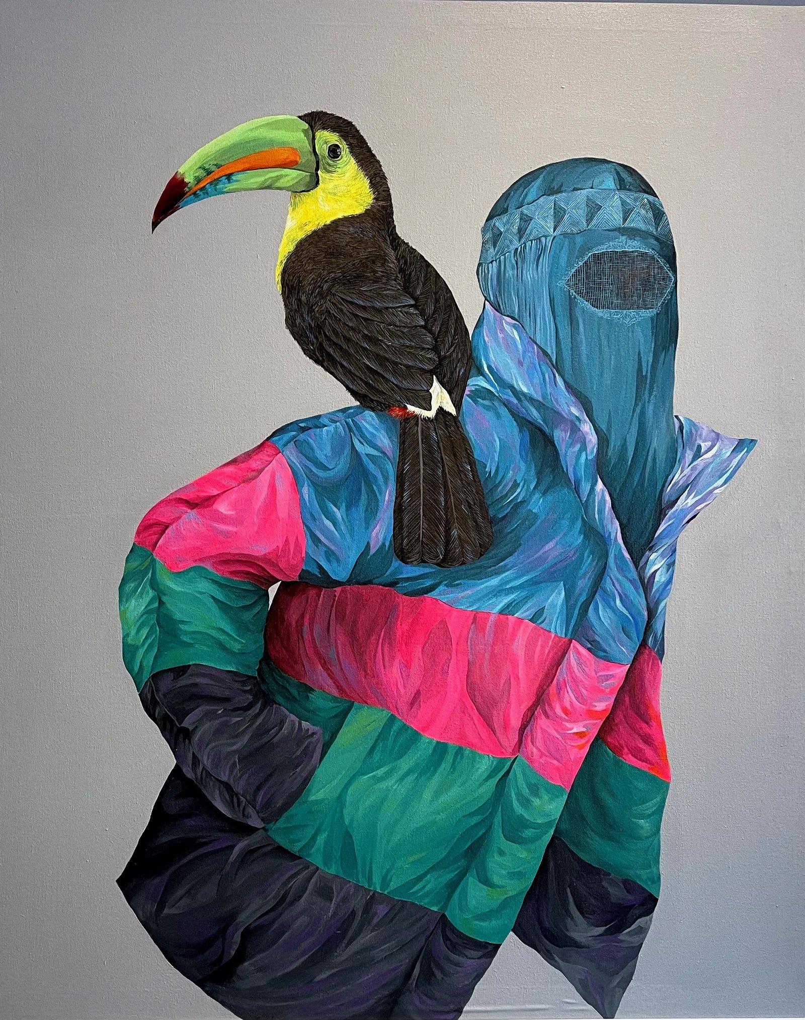 Woman with Toucan: an acrylic canvas of a figure in a blue veil and a colourful padded jacket, with a keel-billed toucan perched on the shoulder.