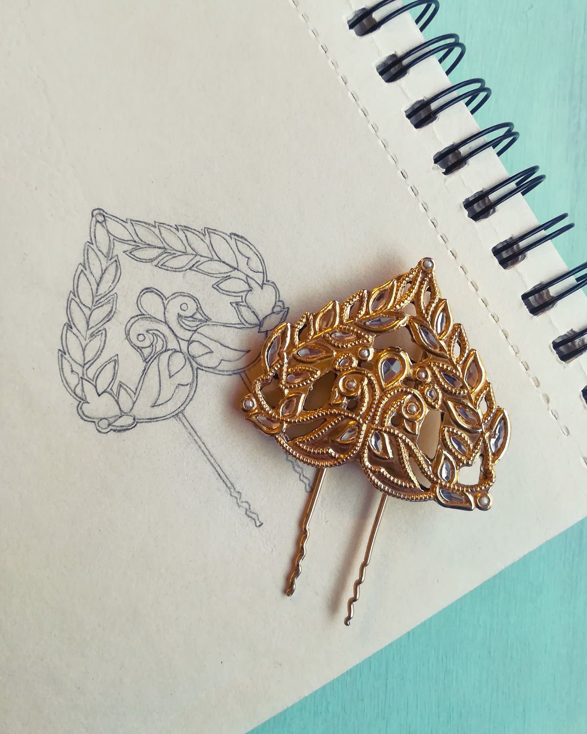 Jewellery design study in pencil and pen on paper, drawing 47.