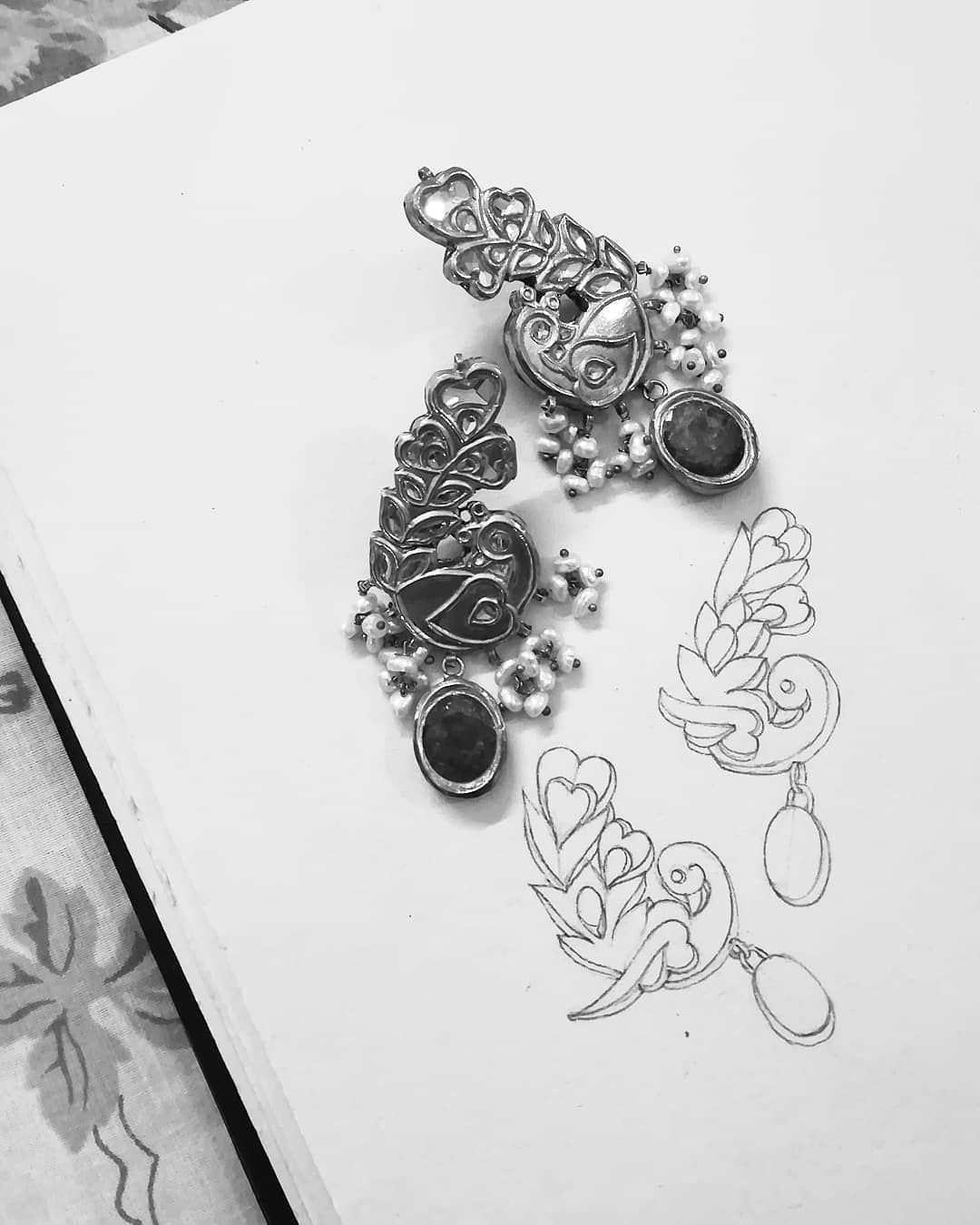 Jewellery design study in pencil and pen on paper, drawing 50.