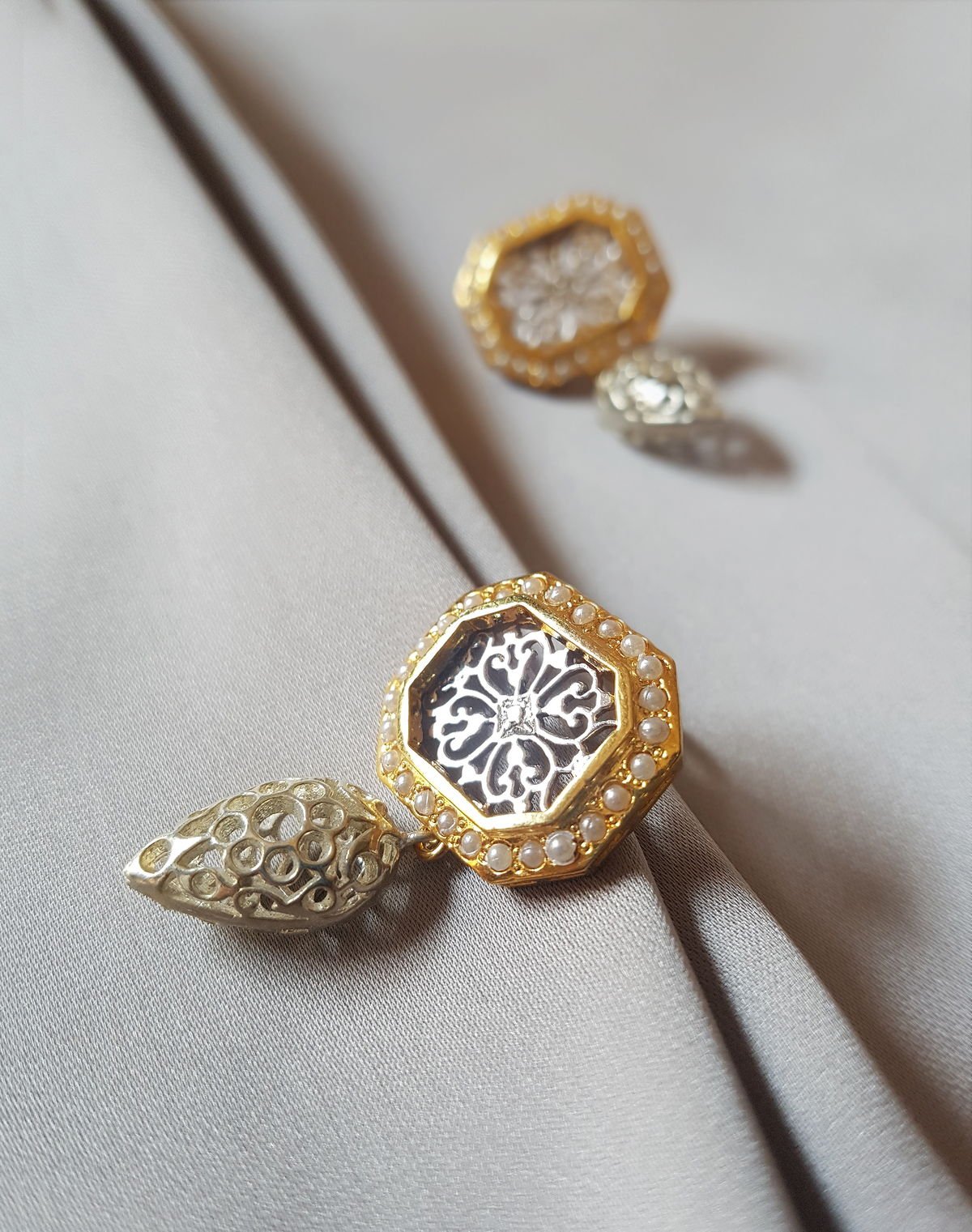 Detail view of the jaali Filigree Earrings with Pearls, from the Filigree collection.