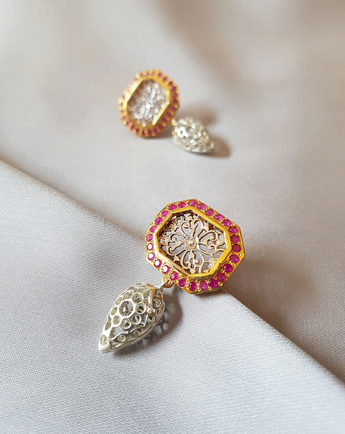 Detail view of the jaali Filigree Earrings with Rubies, from the Filigree collection.