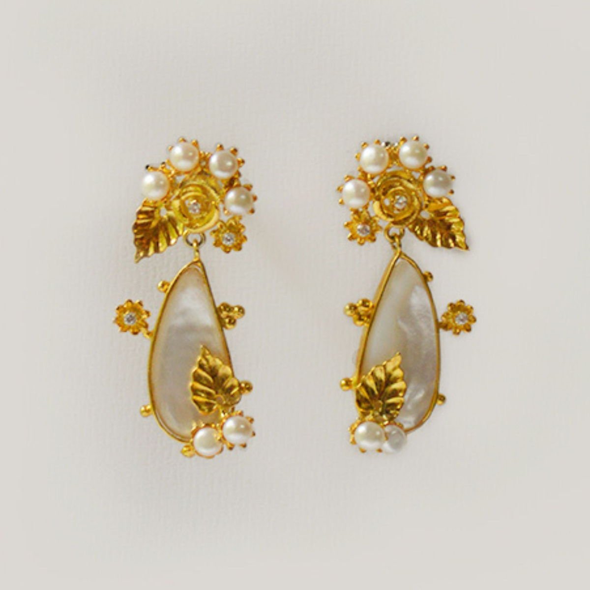 Floral Cluster Earrings with Mother of Pearl and Zircons, from the Lei collection.