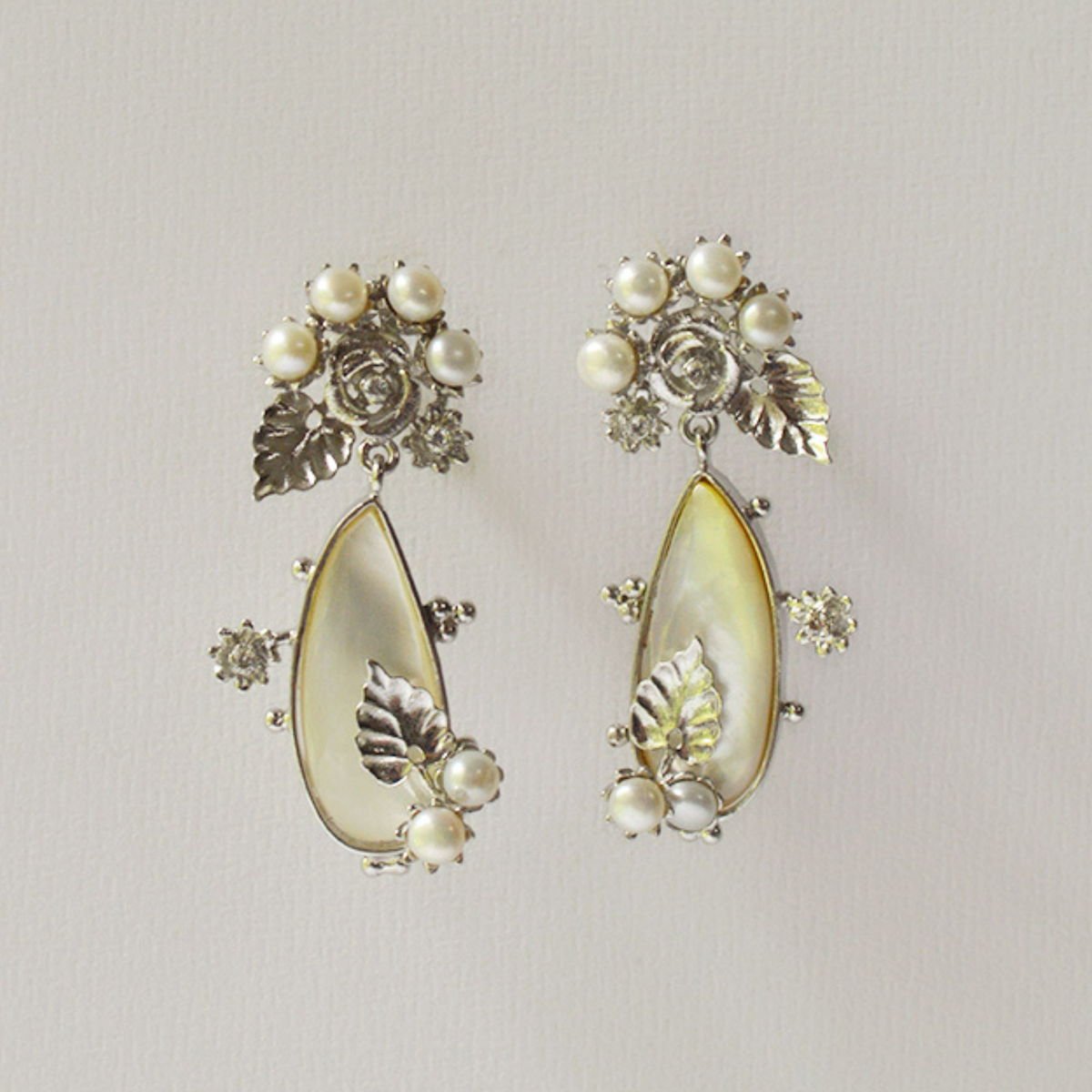 Floral Cluster Earrings with Mother of Pearl and Zircons, from the Lei collection.