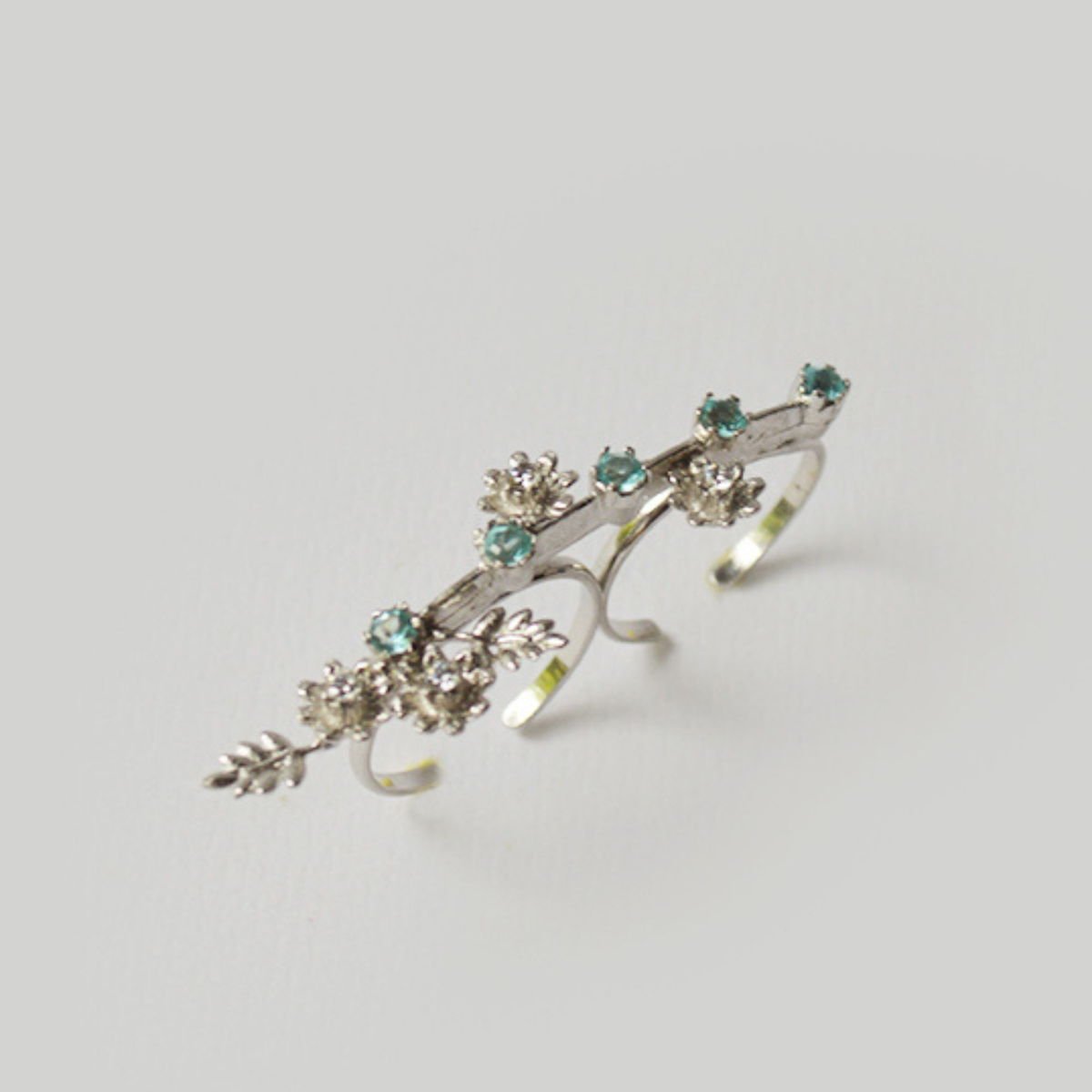 Lei double ring with Zircons, from the Lei collection.