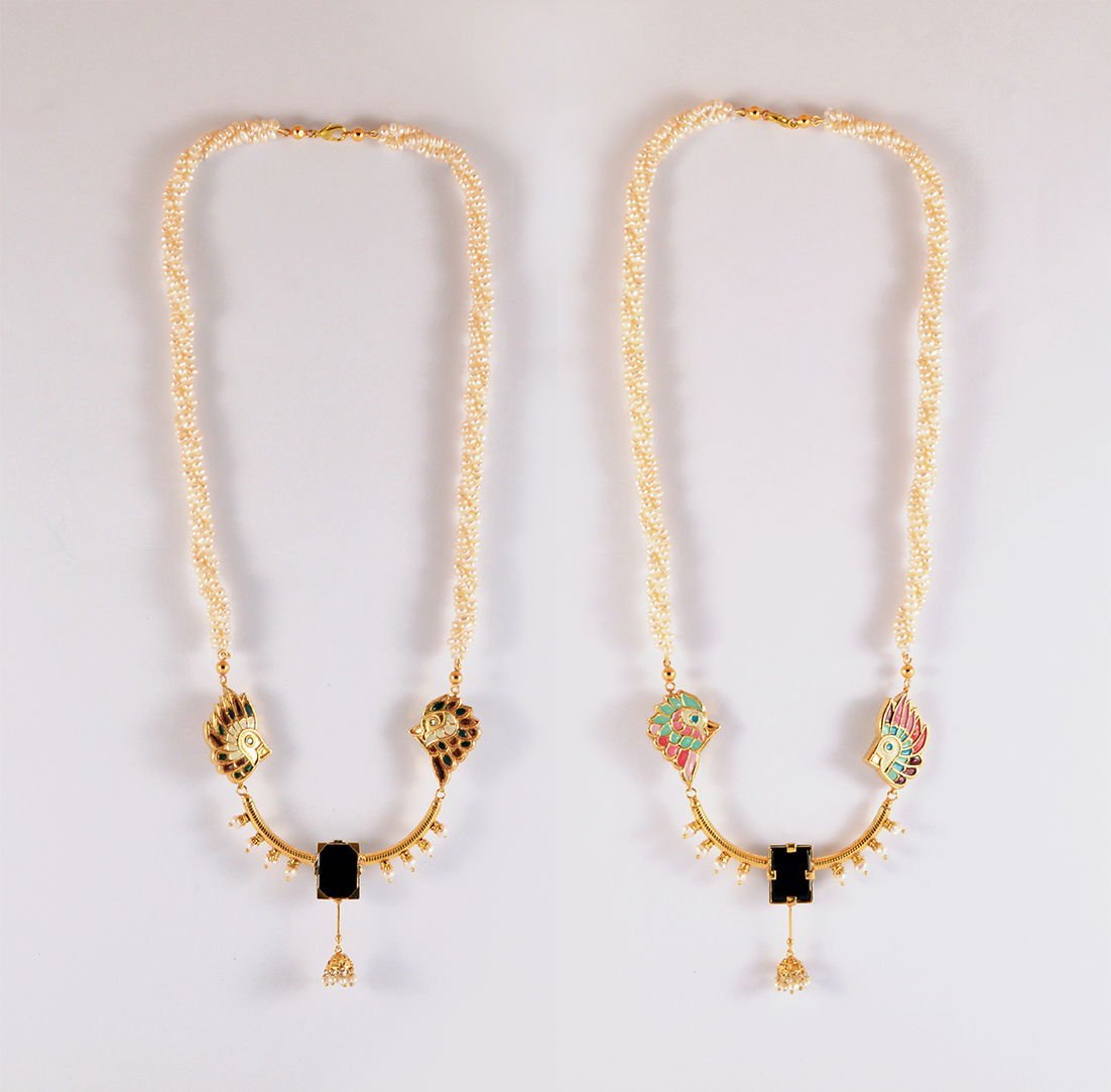 Bird pair necklace with Onyx and pearl detail, from the Safari collection.