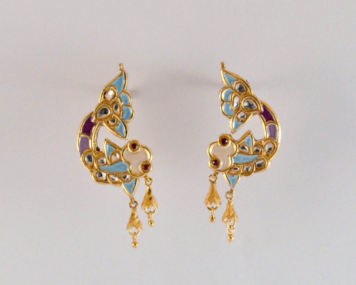 Curved Fish Earrings with kundan and enameled fronts, from the Safari collection.