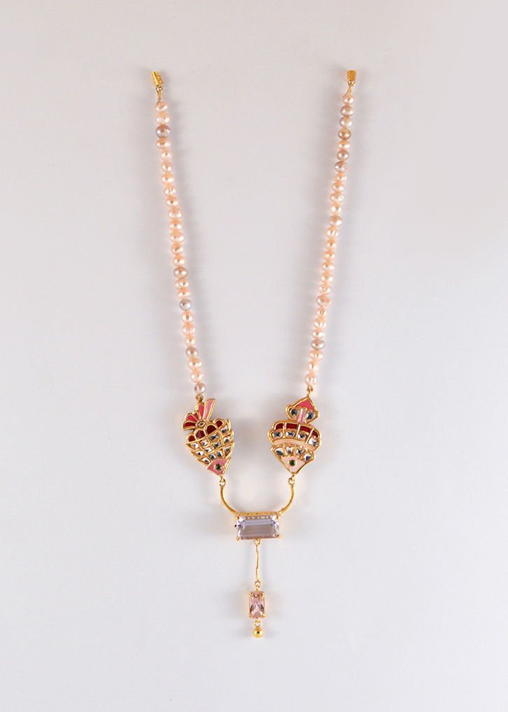 Fish pair Necklace with Pink and purple zircon crystals and pearl necklace, from the Safari collection.
