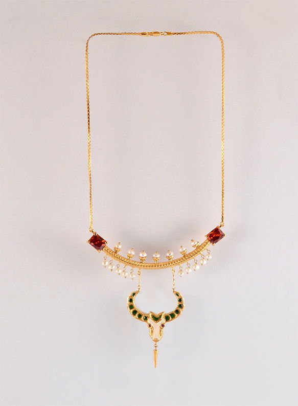 Bull head Necklace with Red zircon and pearl details, from the Safari collection.